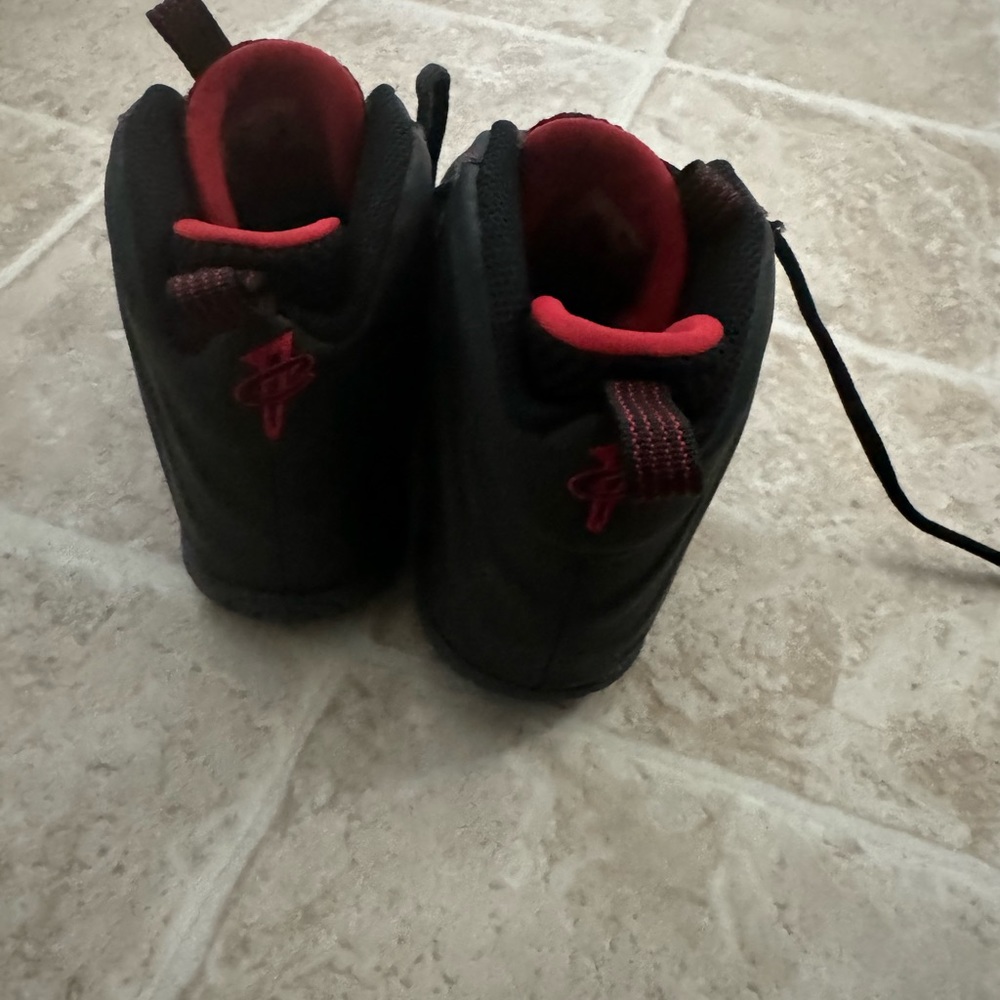 Size 13c black and red Foam Posites.